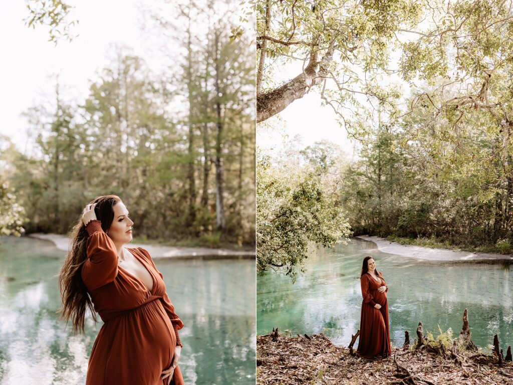 Expecting couple embracing peacefully by crystal-clear river, surrounded by lush trees and golden light during Florida maternity session