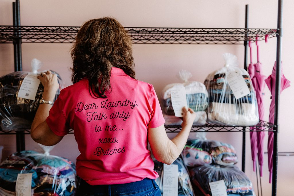 Lifestyle branding photography featuring family moments at Dirty Britches Laundromat in Spring Hill, Florida