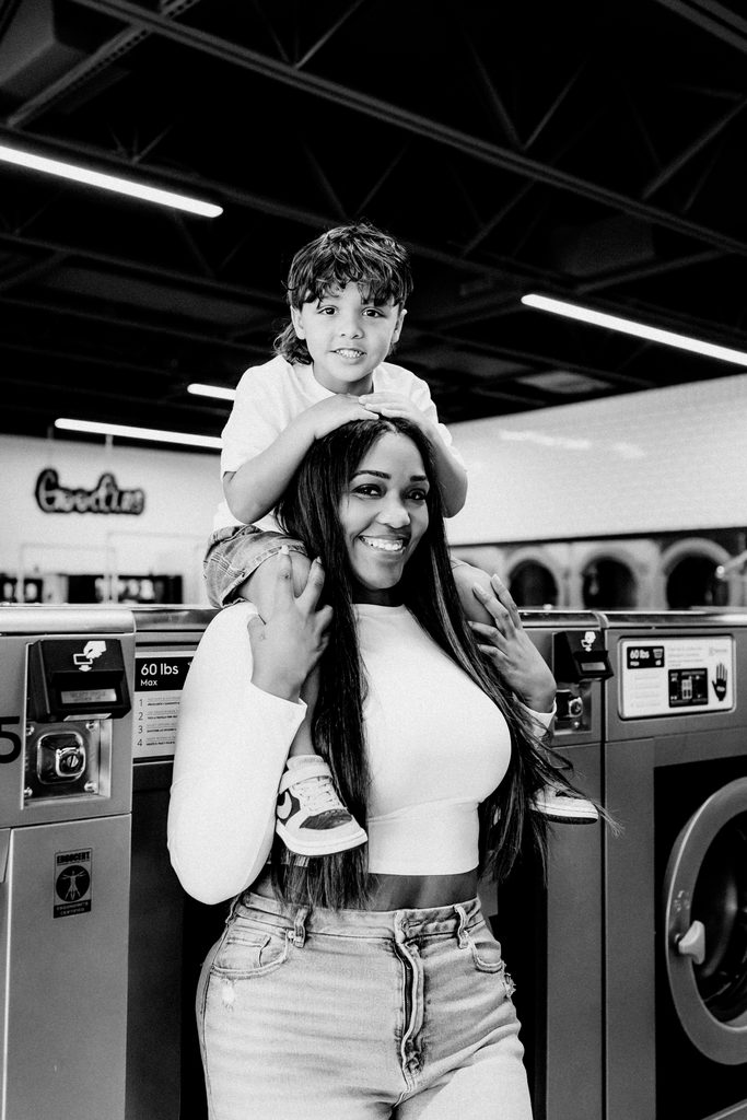 Lifestyle branding photography featuring family moments at Dirty Britches Laundromat in Spring Hill, Florida