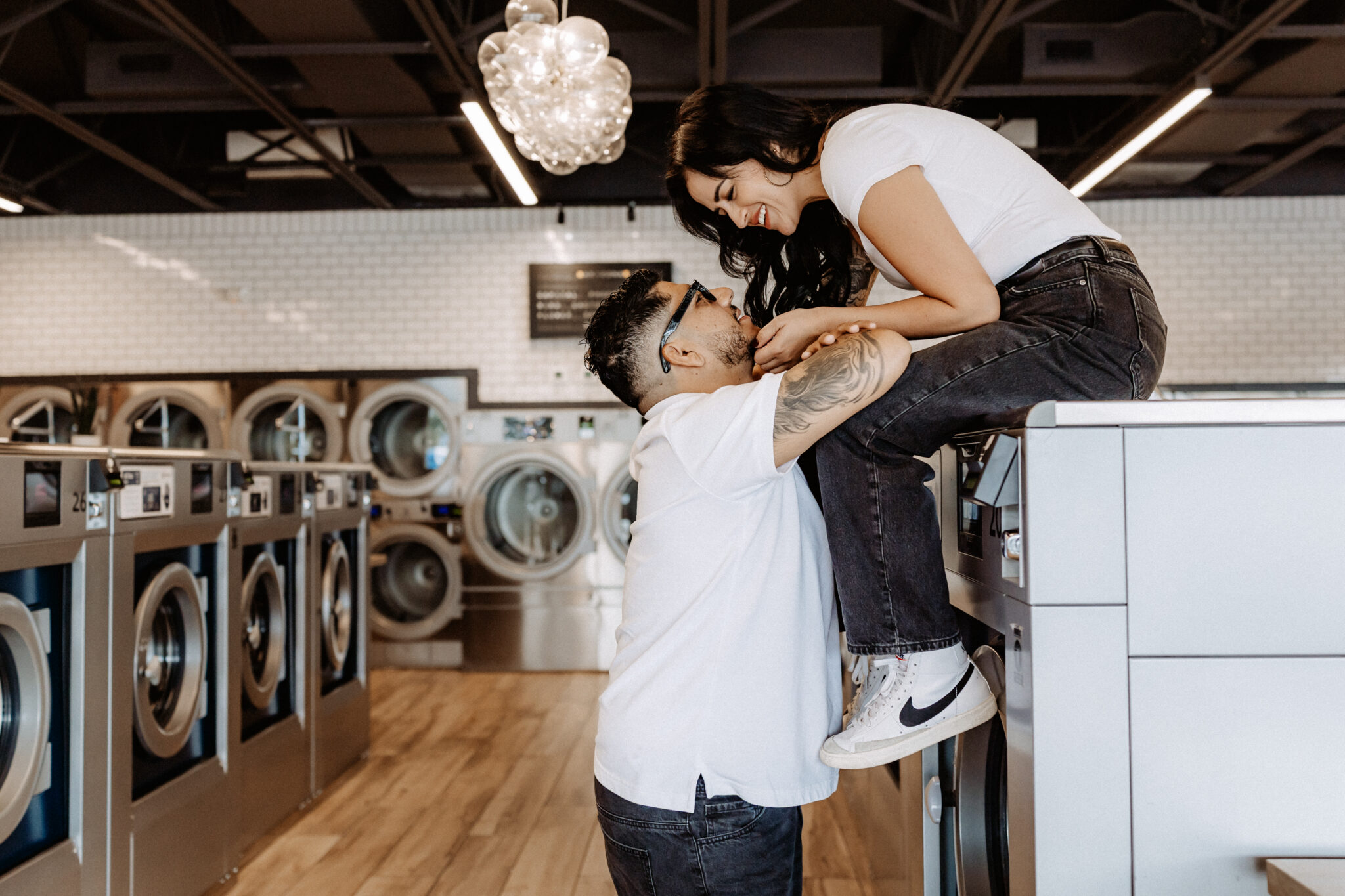 Lifestyle branding photography featuring family moments at Dirty Britches Laundromat in Spring Hill, Florida