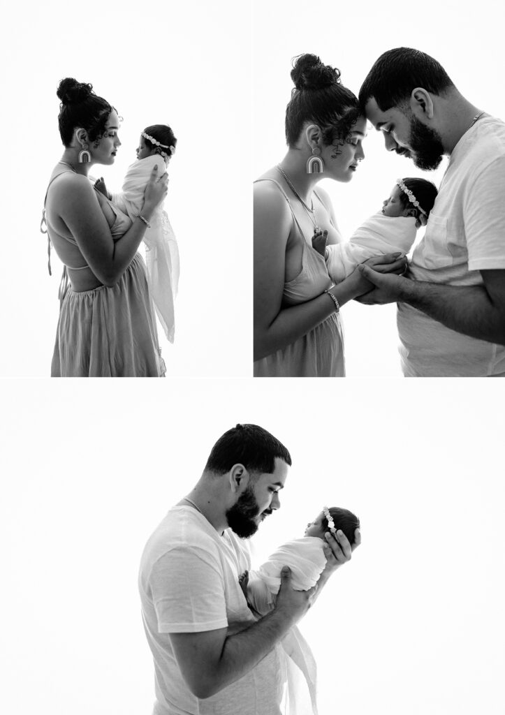 Newborn photography family session woman with baby with man with white background in studio in Tampa Bay, Florida Nadine B Photography