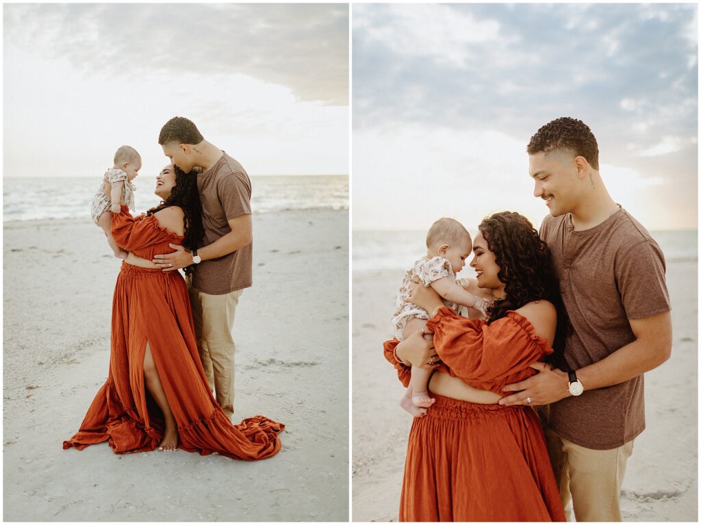 Family portrait featuring Taylor in a rust-colored two-piece dress, posing with her husband and child at Honeymoon Island beach