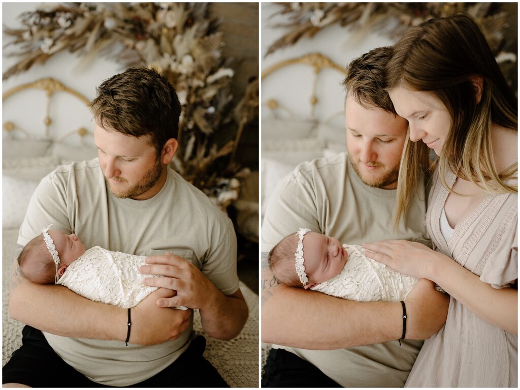 Beautiful family bonding moment captured in a cozy studio, showcasing mom, dad, and their 1-week-old baby girl in coordinated outfits against a bohemian backdrop