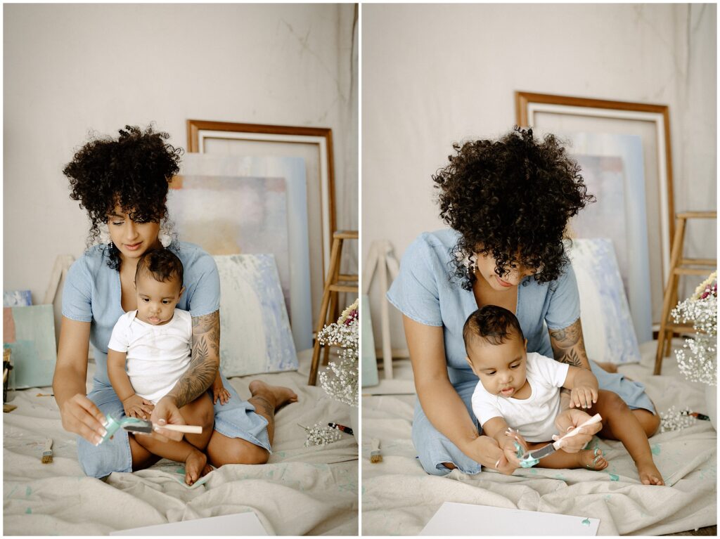 Happy mom and son painting with blue brushes at springhill florida photography studio