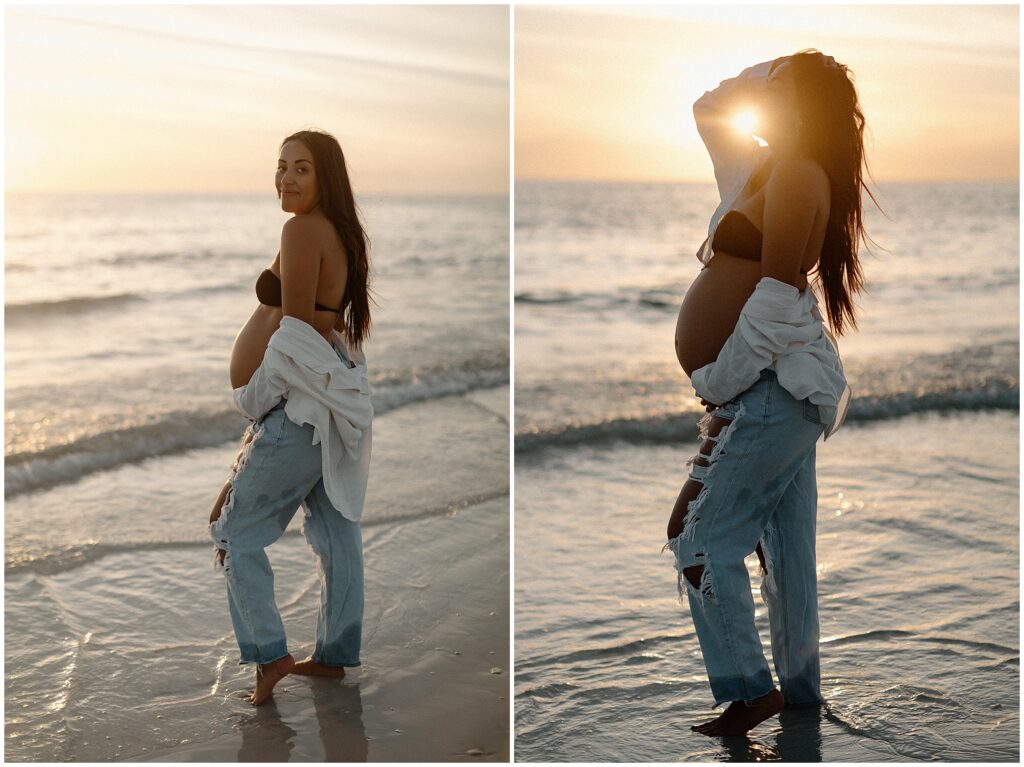 Beach maternity session of mom wearing black bikini and jeans in springhill florida