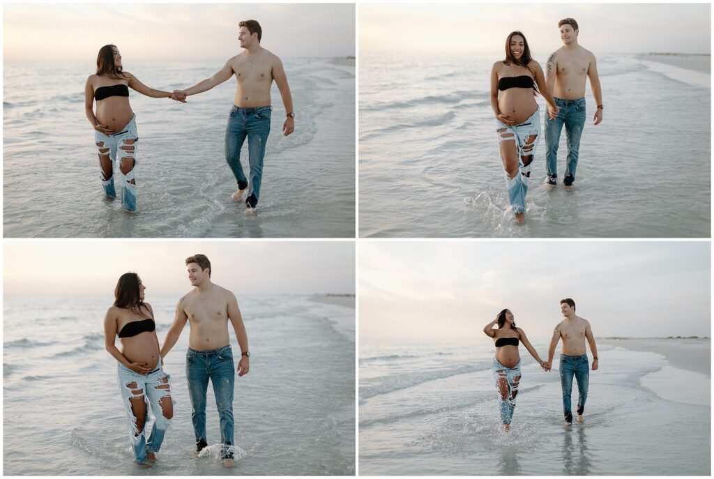 Maternity portraits of mom and dad holding hands while at beach in water in springhill florida