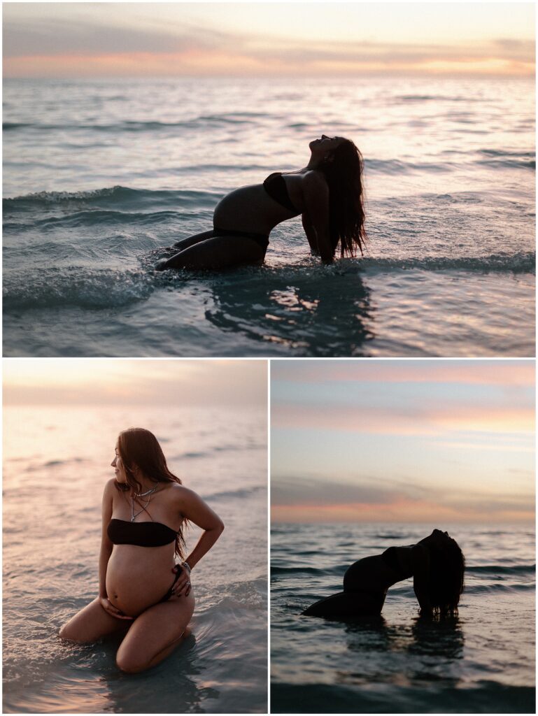 Maternity session of mom in black bikini while playing in water at sunset in springhill florida at beach