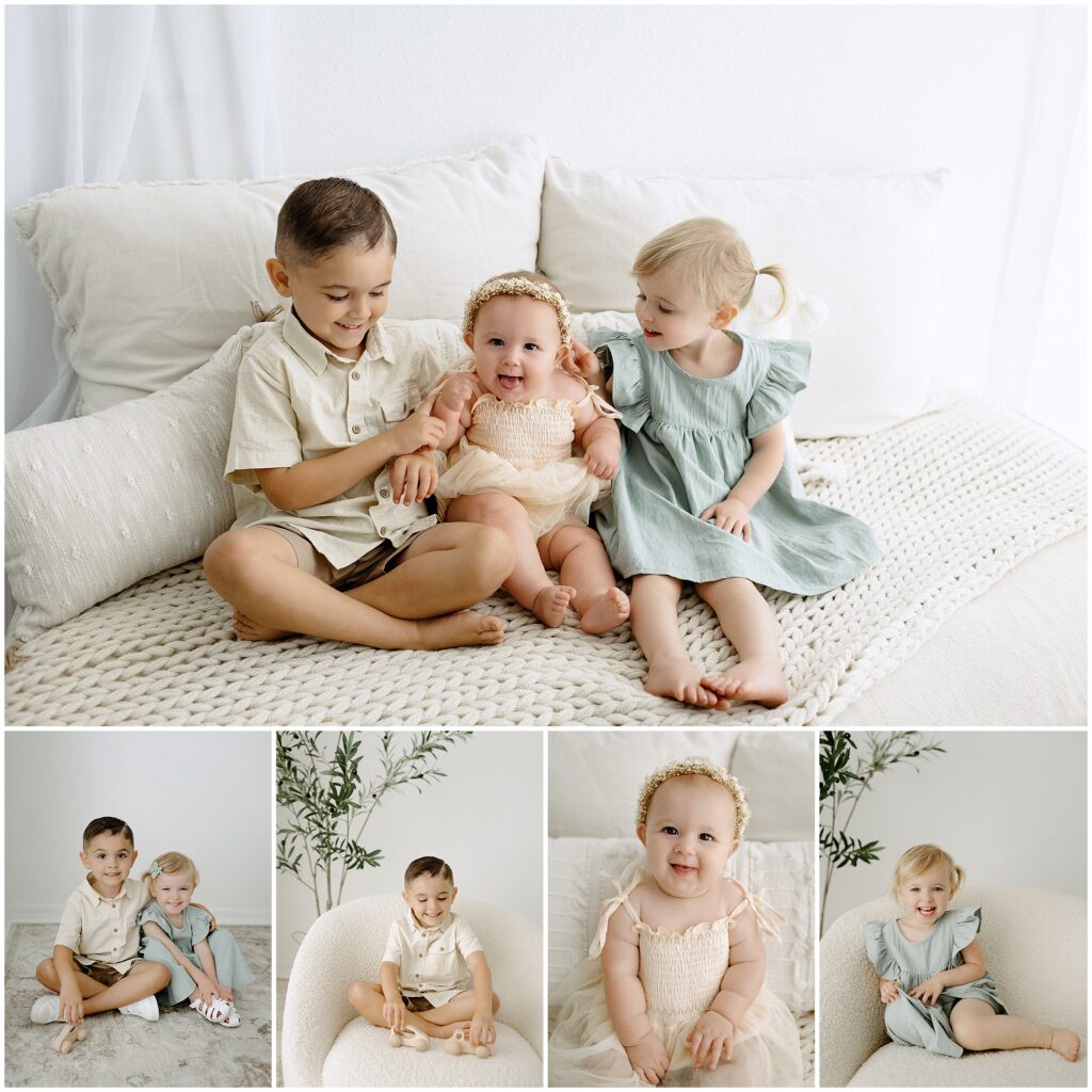 Brother and two sisters sitting on neutral bed during family session in Springhill florida studio