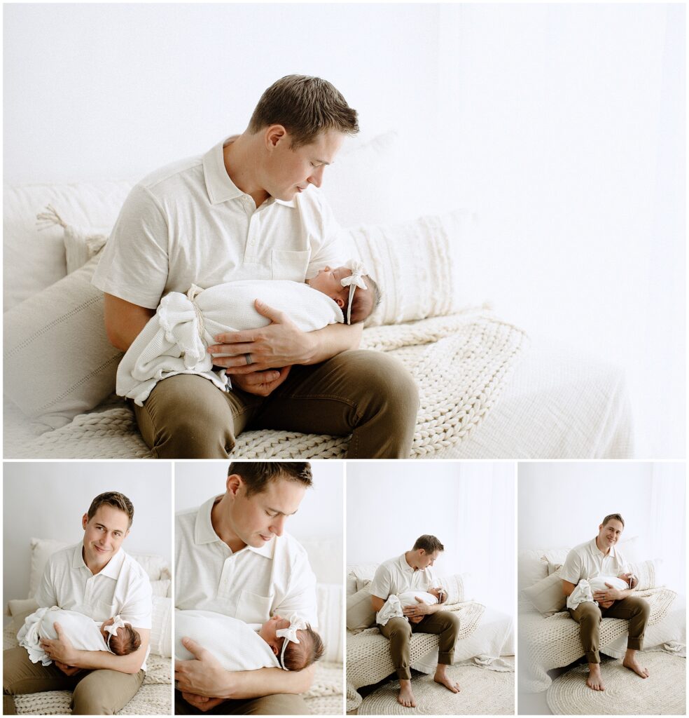 Newborn baby girl with her happy dad at springhill florida photography studio