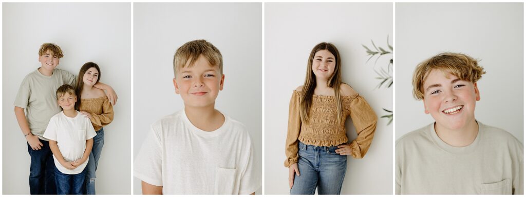 Siblings bonding and enjoying time together during a family photo shoot in Spring Hill, FL studio