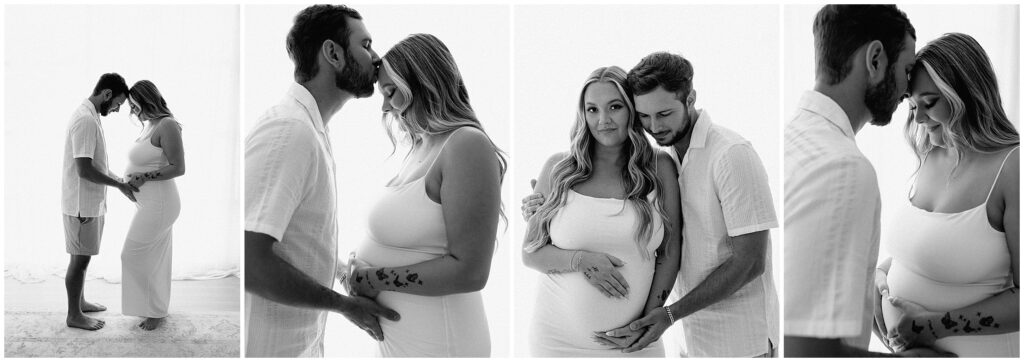 Black and white portrait of couple smiling during indoor maternity session at Spring Hill Studio