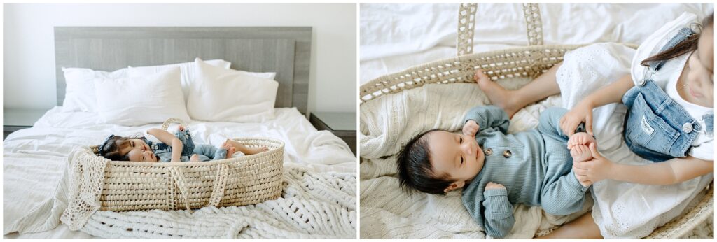 Brother and sister lying in basket on bed