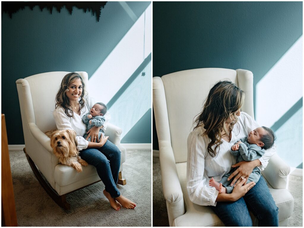 Mom holding baby boy in white rocking chair in front of blue wall