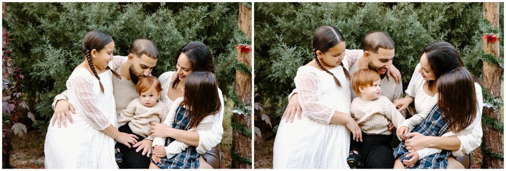 Lifestyle candid moments of family snuggling and laughing together at Blue Acres Christmas Tree Farm in Florida