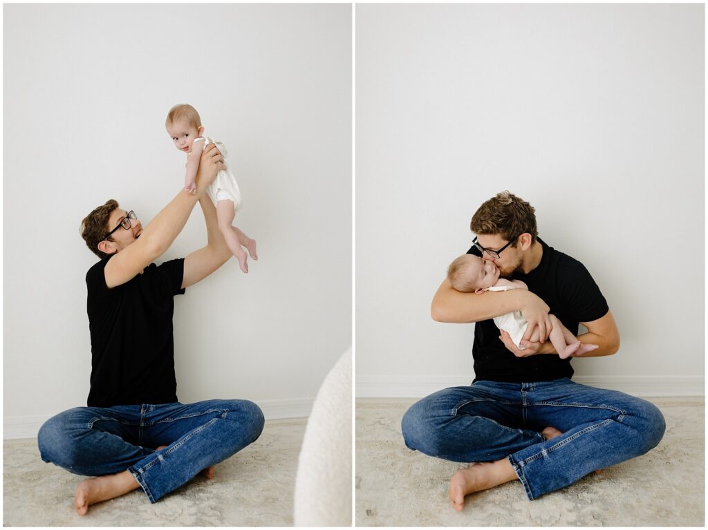 Dad in black shirt and jeans sitting on floor in studio playing with his daughter, Spring Hill Studio in Florida