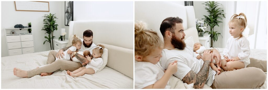 Dad and kids laying on bed during in home newborn lifestyle