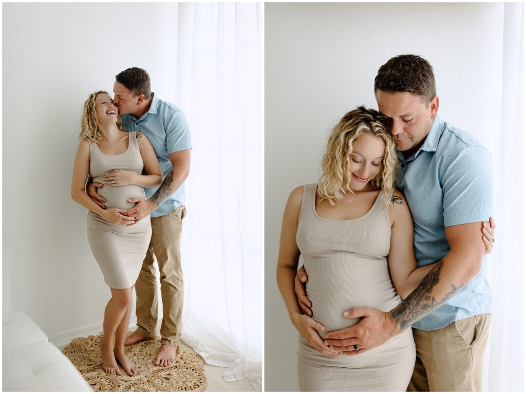 Pregnant woman in a nude dress with husband holding belly at Spring Hill Studio.