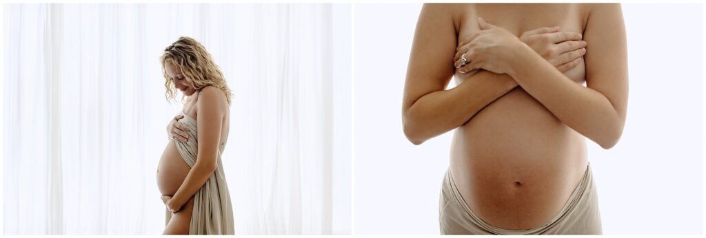 Maternity session with pregnant woman in nude fabric skirt, topless, holding belly at Spring Hill Studio in Florida